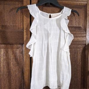 White sleeveless blouse